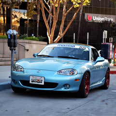 NB Miata with retro Mazda Racing Banner